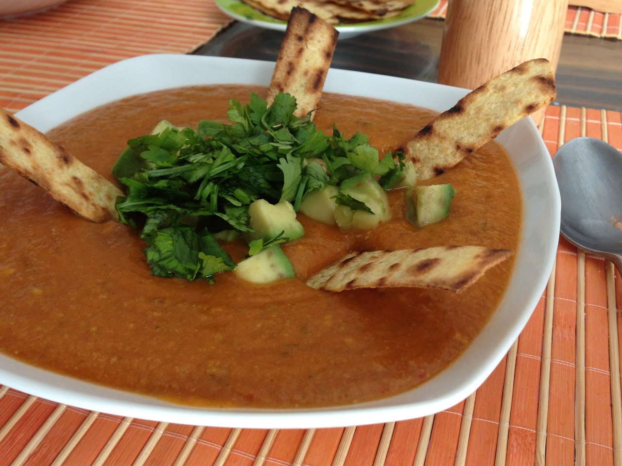 Tomato Soup with Tortilla, Pumpkin, and Avocado