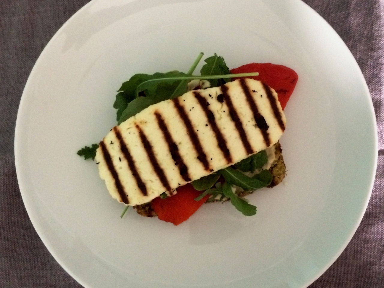Toasts with Hummus, Arugula, and Grilled Adyghe Cheese