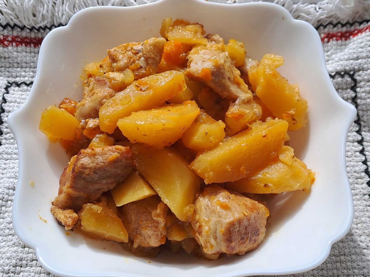 Stewed Potatoes with Meat in a Skillet