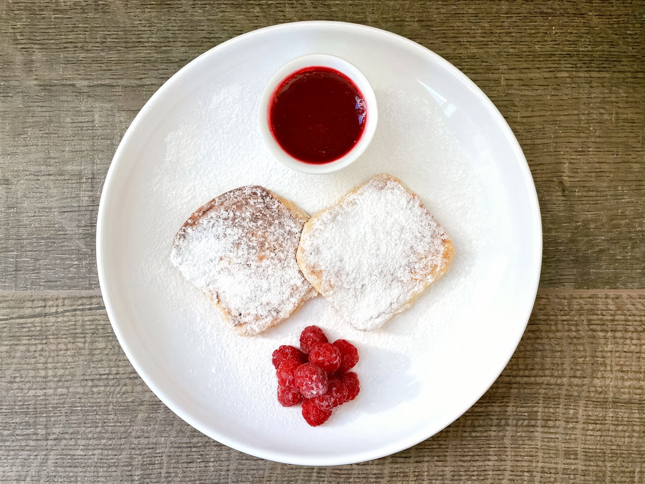 Baked Cheese Pancakes with Raspberry Sauce