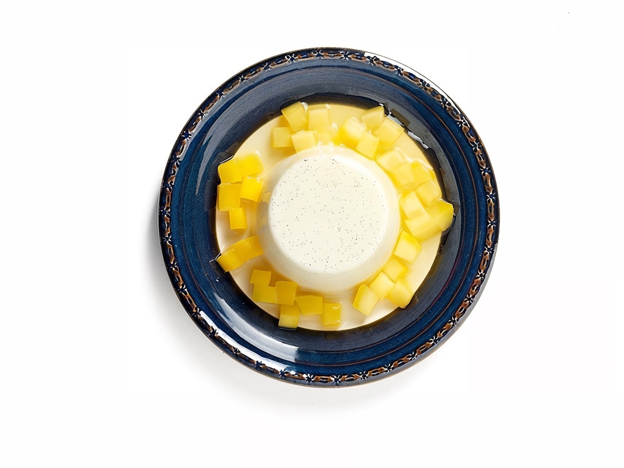 Vanilla Panna Cotta with Mango in Syrup
