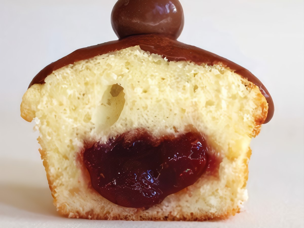 Vanilla Cupcakes with Chocolate Glaze, Cherries, and Strawberry Jam Filling