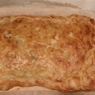 Фотография рецепта Пирог из слоеного теста с начинкой из капусты зеленого лука и яйца автор игорь пищулин