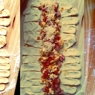 Фотография рецепта Слоеная косичка с колбасой помидорами и сыром автор Елизавета Обрывина