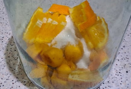 Фото шага рецепта Абрикосовый компот на зиму с апельсином и корицей 186593 шаг 7  