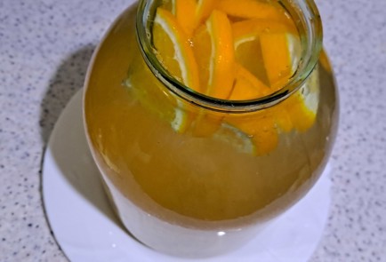 Фото шага рецепта Абрикосовый компот на зиму с апельсином и корицей 186593 шаг 9  