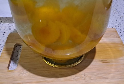 Фото шага рецепта Абрикосовый компот с лимоном и имбирем на зиму 186594 шаг 10  