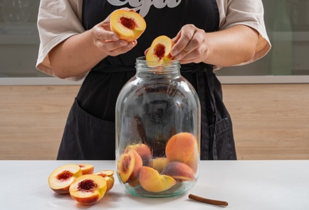 Фото шага рецепта Компот из персиков на зиму 174213 шаг 7  