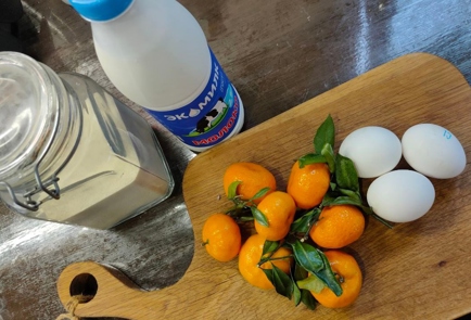 Фото шага рецепта Манник с мандаринами 175335 шаг 1  