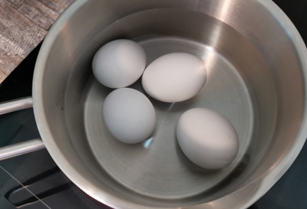 Фото шага рецепта Пасхальные яйца окрашенные в рисе 176233 шаг 3  