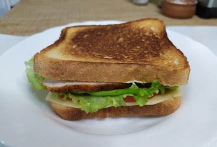 Фото шага рецепта Тосты с курицей 190749 шаг 10  