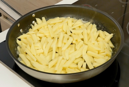 Фото шага рецепта Жареная картошка 126415 шаг 7  