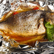 Карп, запеченый с орехами, зернами граната и пряностями