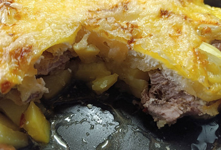 Фото шага рецепта Свиная вырезка пофранцузски с ананасами 190869 шаг 18  