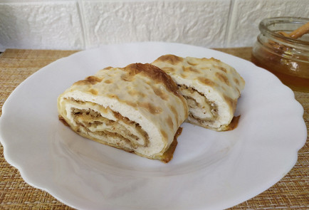 Фото шага рецепта Рулет из лаваша с творогом 190884 шаг 10  